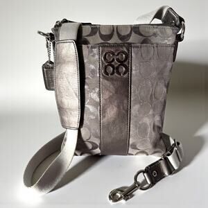 COACH 46744 Julia Op Art Signature Silver Metallic Jacquard Leather Swingpack